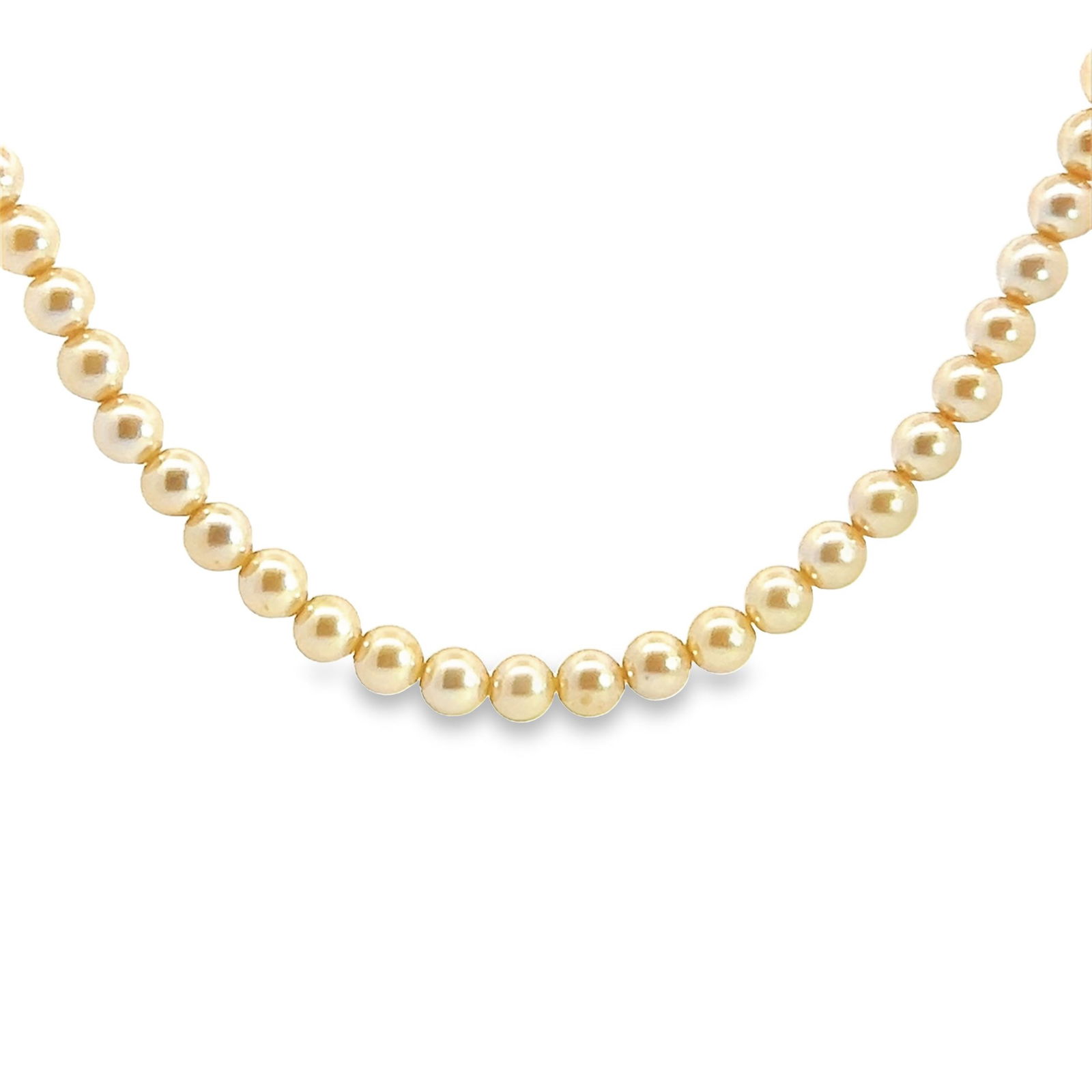 Strand of Cultured Peach Pearl Necklace: Strand of cultured peach pearl necklace, comprised of 112 cultured pearls of peach color, measuring approximately 5 mm in diameter. Length:23.62"(60 cm); 32.9 dwt