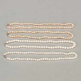Four Strands of White, and Peach Pearl Necklaces
