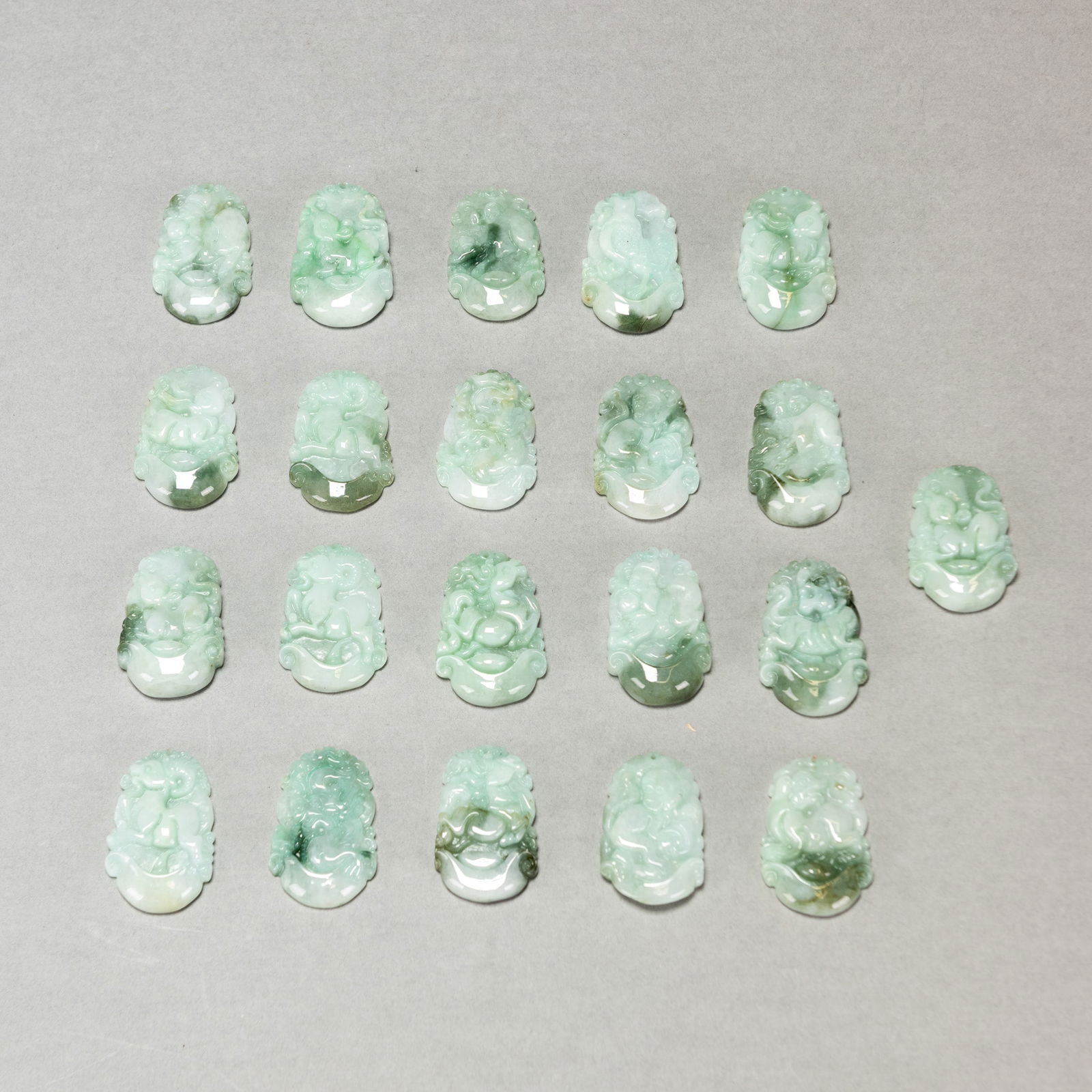 Group of Twenty-one Jadeite Zodiac Pendants (1 of 4)