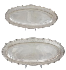 A graduated pair of Continental .930 silver fish platters