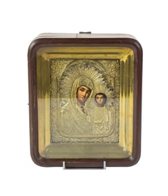 A Russian gilt brass icon of Kazanskaya Mother of God