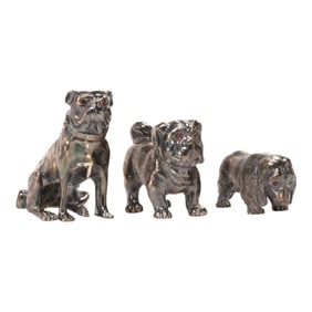 Three Russian Faberge style .875 silver silver figures of dogs, each inlaid with garnet eyes, each