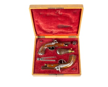 A Belgian cased pair of percussion pistols