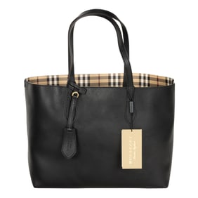 A Burberry black grained leather tote bag with 'Haymarket' check coated canvas interior