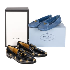 Two pairs of Gucci and Prada women's shoes in boxes