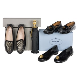 Three pairs of McQueen, Prada, Tod's women's shoes and a McQueen umbrella