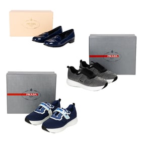 Three pairs of Prada women's sneakers and loafers in original boxes