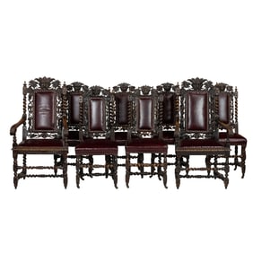 A suite of eight Renaissance style dining chairs