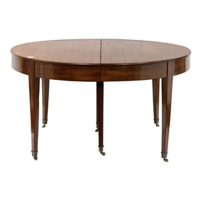 A highly figured mahogany banquet table in the Federal taste