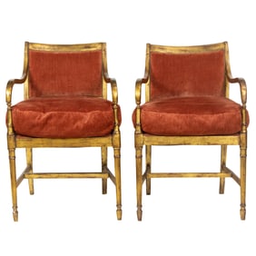 A pair of French Neoclassical style giltwood armchairs circa 1860