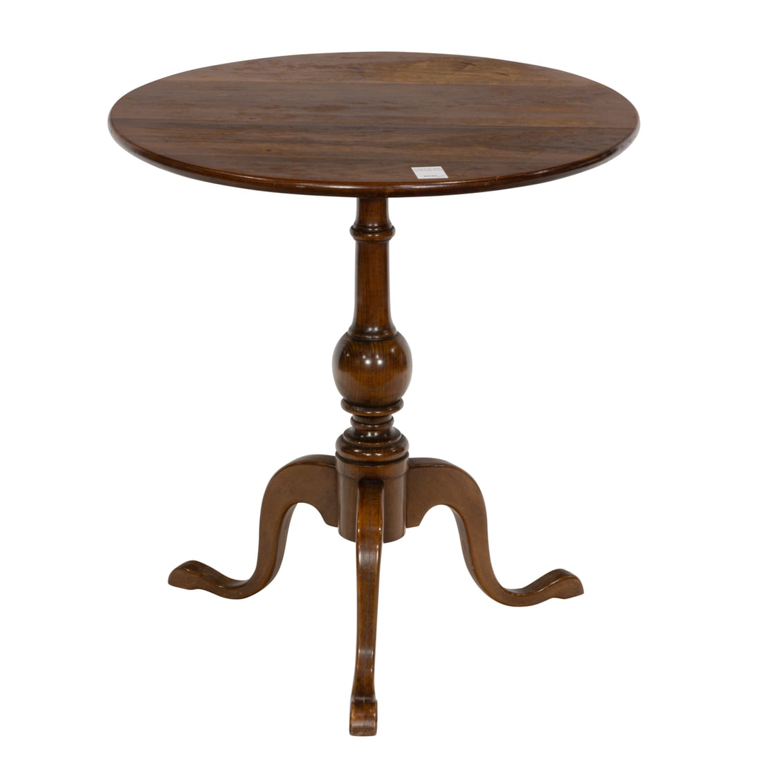 A Stickley Cherry Valley tilt-top tea table: A Stickley Cherry Valley tilt-top tea table, model 5055, the round top on pedestal ending in tripod supports, 25.5"h x 23.5"dian