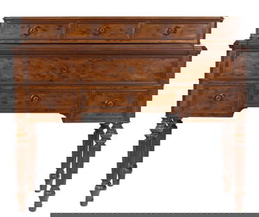 A Classical plum pudding mahogany secretary, circa 1830: A Classical plum pudding mahogany secretary, circa 1830, the slide out hinged large drawer opening to the fitted interior with leather writing surface, surmounted by the three drawer gallery, and risi