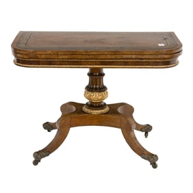 An English Regency brass inlaid and partial gilt games table, circa 1810