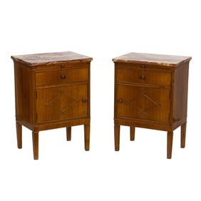 A pair of French bedside tables with marble tops