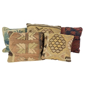 An Aubusson tapestry fragment pillow together with four kilim or Belouch rug fragment pillows, sizes