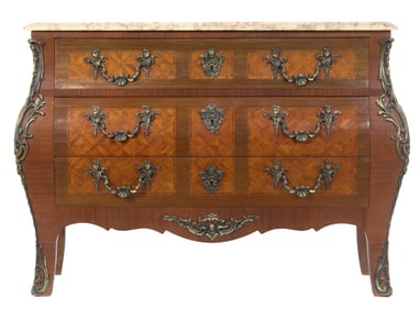 A Louis XV style marquetry inlaid commode with marble top