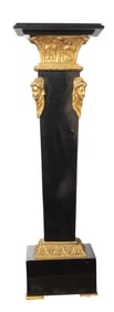 A Neoclassical style gilt bronze mounted black marble pedestal