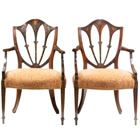 A pair of Edwardian painted decorated armchairs