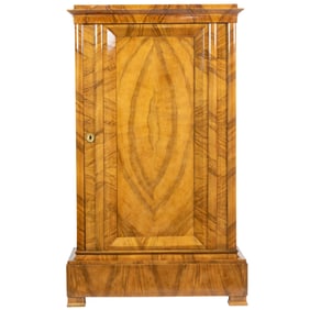 A Biedermeier fruitwood cabinet