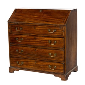 A Chippendale mahogany slant front desk
