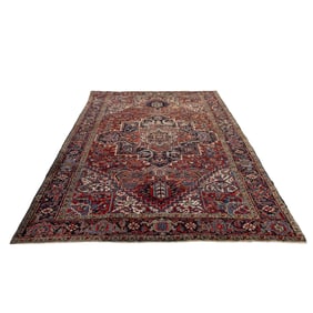 A Persian Heriz carpet