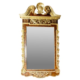 A George II parcel gilt and walnut veneer mirror