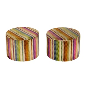 A group of Missoni Home pillows and poufs