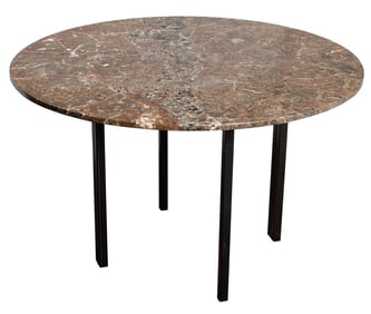 A contemporary marble and metal dining table
