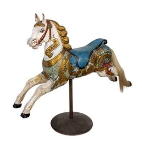 A carved wood polychrome carousel horse, circa 1900