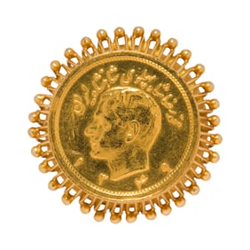 A gold coin and 18k gold ring