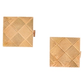 A pair of 14k gold cufflinks