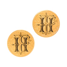 A pair of gold love token collar buttons