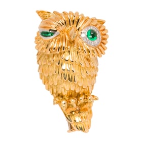 An 18k gold and gem-set winking owl brooch