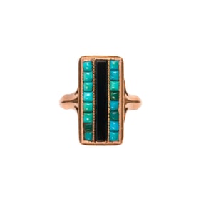 An antique turquoise, onyx and 18k gold ring
