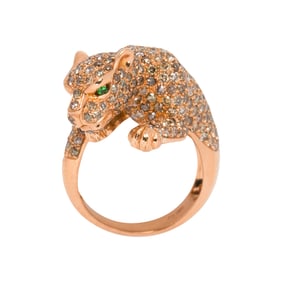 A colored diamond and 18k gold tiger ring