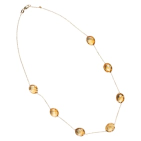 A citrine and 14k gold necklace