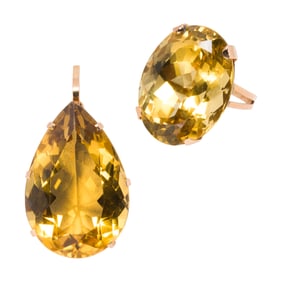 A citrine and 14k gold pendant and ring
