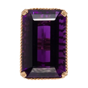An amethyst and 14k gold ring
