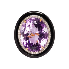 An amethyst, diamond, onyx, silver and 14k gold ring