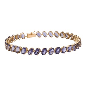 A tanzanite and 14k gold bracelet