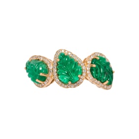 An emerald, diamond and 18k gold ring