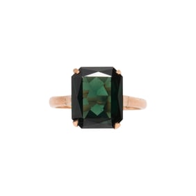 A green stone and 14k gold ring