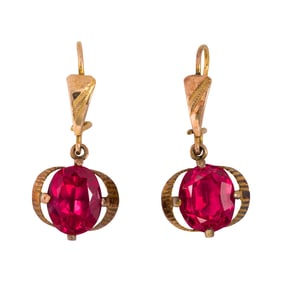 A pair of red stone and 14k gold earrings