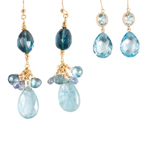 Two pairs of blue topaz and gold earrings