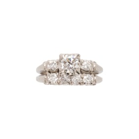 A diamond and platinum wedding set ring