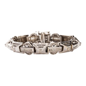 A diamond and 14k white gold bracelet