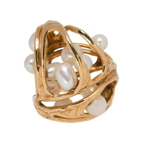 A freshwater cultured pearl and 14k gold ring