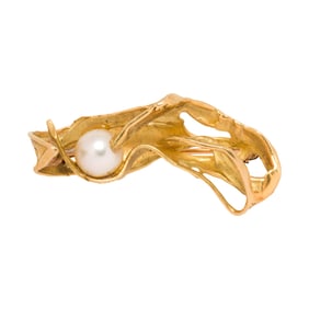 An 18k gold and cultured pearl brooch