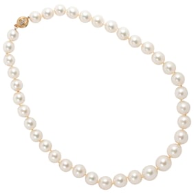 A South Sea cultured pearl, diamond and 14k gold necklace