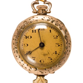 A gold tone wristwatch